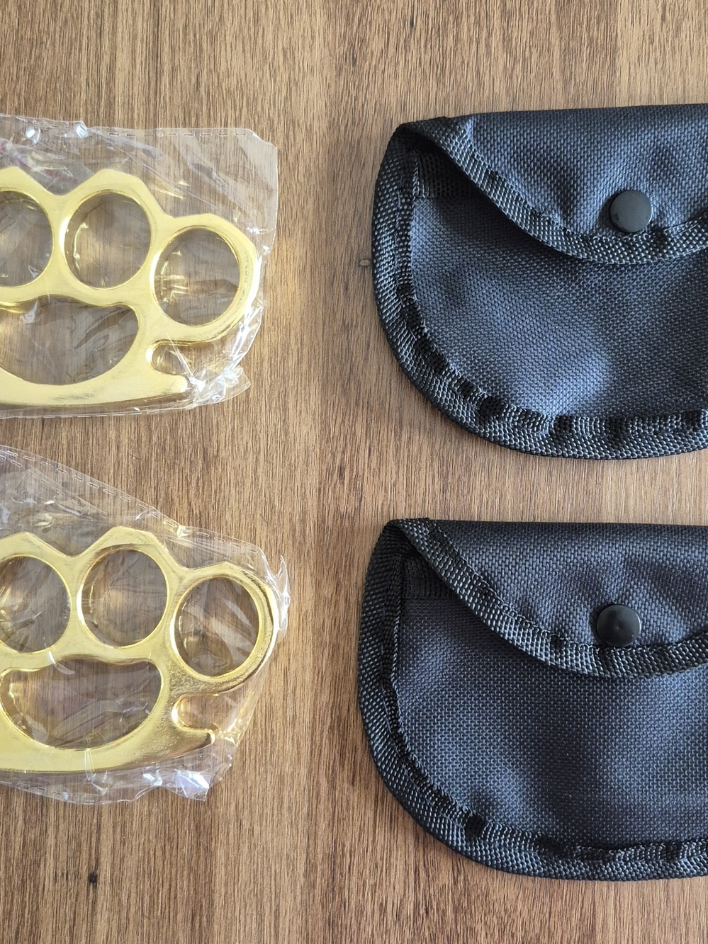 Sleek Gold Self-Defense Knuckle Set with Pouches